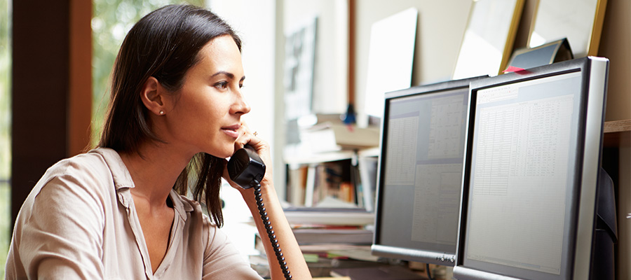 Woman speaking by Phone Image